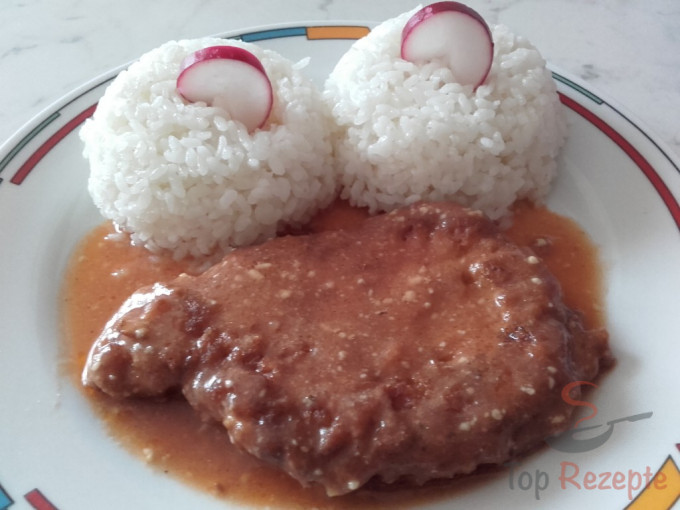 Rezept Überbackene Schnitzel mit Soße und Reis
