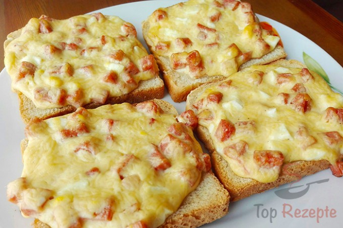 Rezept Toastbrot mit Schinken und Käse überbacken