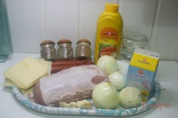 Zubereitung des Rezepts Schweinelachs unter Zwiebel-Wurst-Käse-Haube, schritt 1