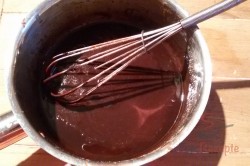 Zubereitung des Rezepts Leckerer Nuss-Zucchinikuchen mit Kakaoglasur, schritt 9