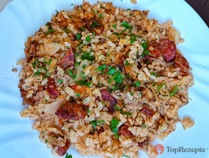 Rezept Leckerer Sauerkraut-Reis-Auflauf - Ein leckeres, schnelles und sättigendes Mittagessen für die ganze Familie.