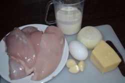 Zubereitung des Rezepts Überbackene Hähnchenfleischbällchen in Sahne, schritt 1