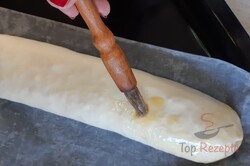 Zubereitung des Rezepts Schnelle Blätterteigrolle mit Schinken und Käse - schnell und einfach, schritt 5
