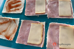 Zubereitung des Rezepts Schinken-Käse-Toasts mal anders - Toastbrot-Schnecken mit Schinken und Käse in Ei gebraten., schritt 2